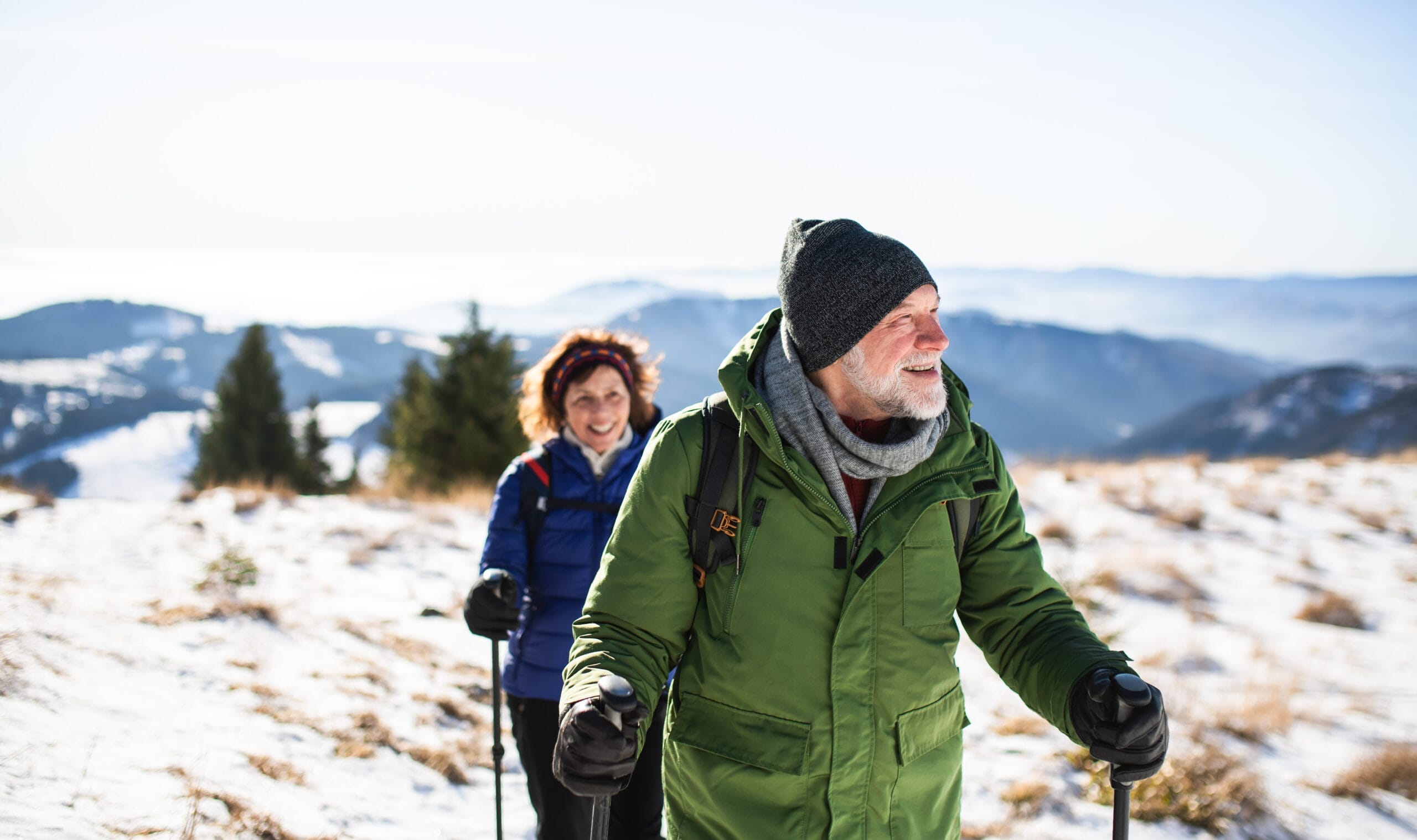 red light therapy benefits for cardiovascular health, couple walkink, snow